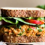 Buffalo Chickpea Salad Sandwich: A Flavorful Delight! 5 Buffalo Chickpea Salad Sandwich Served on Rustic Bread