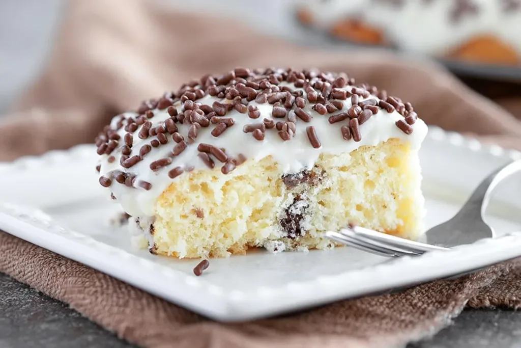 Cannoli Poke Cake: A Sweet Treat You Can't Resist 3 Delicious Cannoli Poke Cake Slice