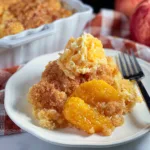 Deliciously Baked Peach Dump Cake Ready to Serve