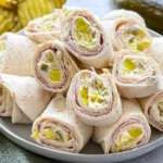 Delicious Pickle Dip Pinwheels on a Platter