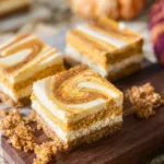Pumpkin Cheesecake Bars: A Delicious Fall Dessert You'll Love 5 Pumpkin Cheesecake Bars Ready to Serve