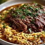 Mouthwatering Slow-Cooked Beef Shoulder with Garlic Orzo