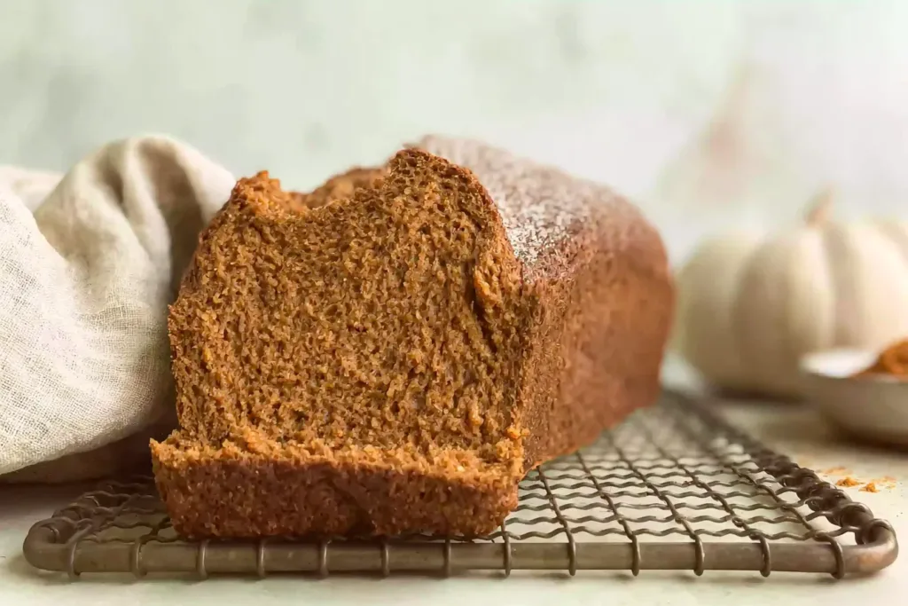 Sourdough Pumpkin Bread Loaf Freshly Baked on a Cooling Rack
