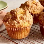 Banana Crumb Muffins: Irresistibly Delicious Breakfast Treats 5 Freshly Baked Banana Crumb Muffins on a Cooling Rack