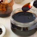 Elderberry Syrup: Boost Your Immunity with This Superfood 5 Elderberry Syrup in a Glass Jar with Fresh Berries