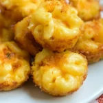 Mini Macaroni and Cheese Bites: Irresistibly Delicious! 5 Mini Macaroni and Cheese Bites on a Platter
