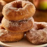 Cozy Cinnamon Sugar Apple Fritters: A Sweet Delight! 5 Cozy Cinnamon Sugar Apple Fritters on a Rustic Plate