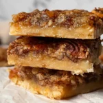Delicious Pecan Pie Bars on Serving Plate