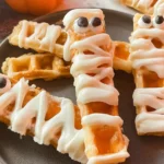 Simple and Spooky Waffle Mummy Sticks Ready for Halloween